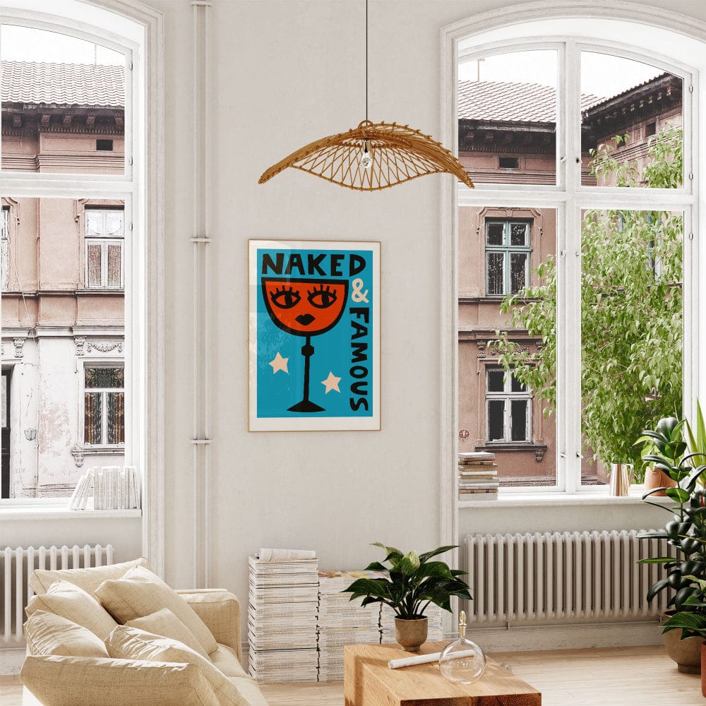 The framed print hangs confidently in a modern living room, its bold colours and cheeky expression adding personality to the space.