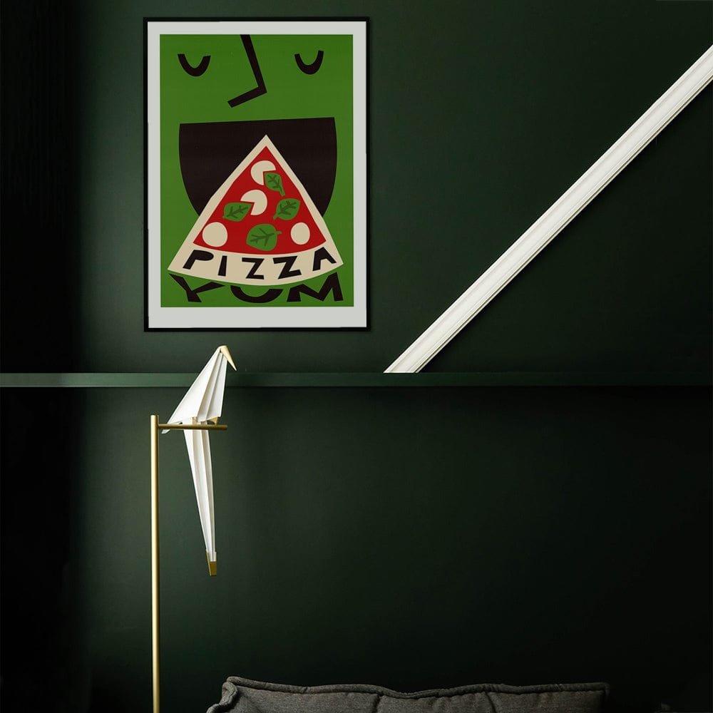 Pizza art print framed against a dark green wall with spotlight illumination — ideal for modern kitchens or dining spaces.