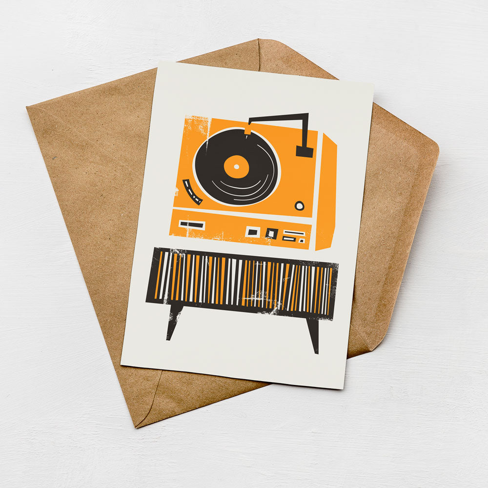 an illustration of a vintage record player with a brown envelope underneath it.