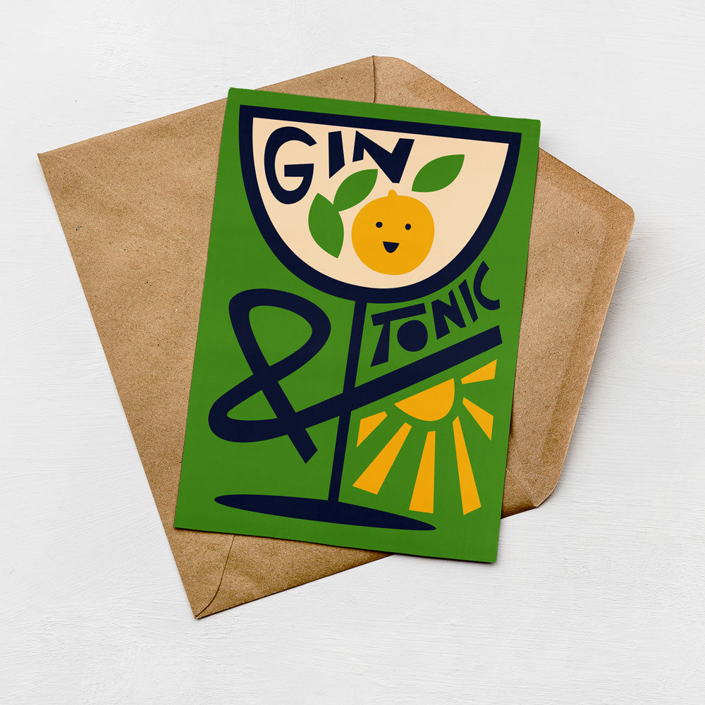 A greeting card with a green background and a stylized illustration of a tequila glass with a smiling face.