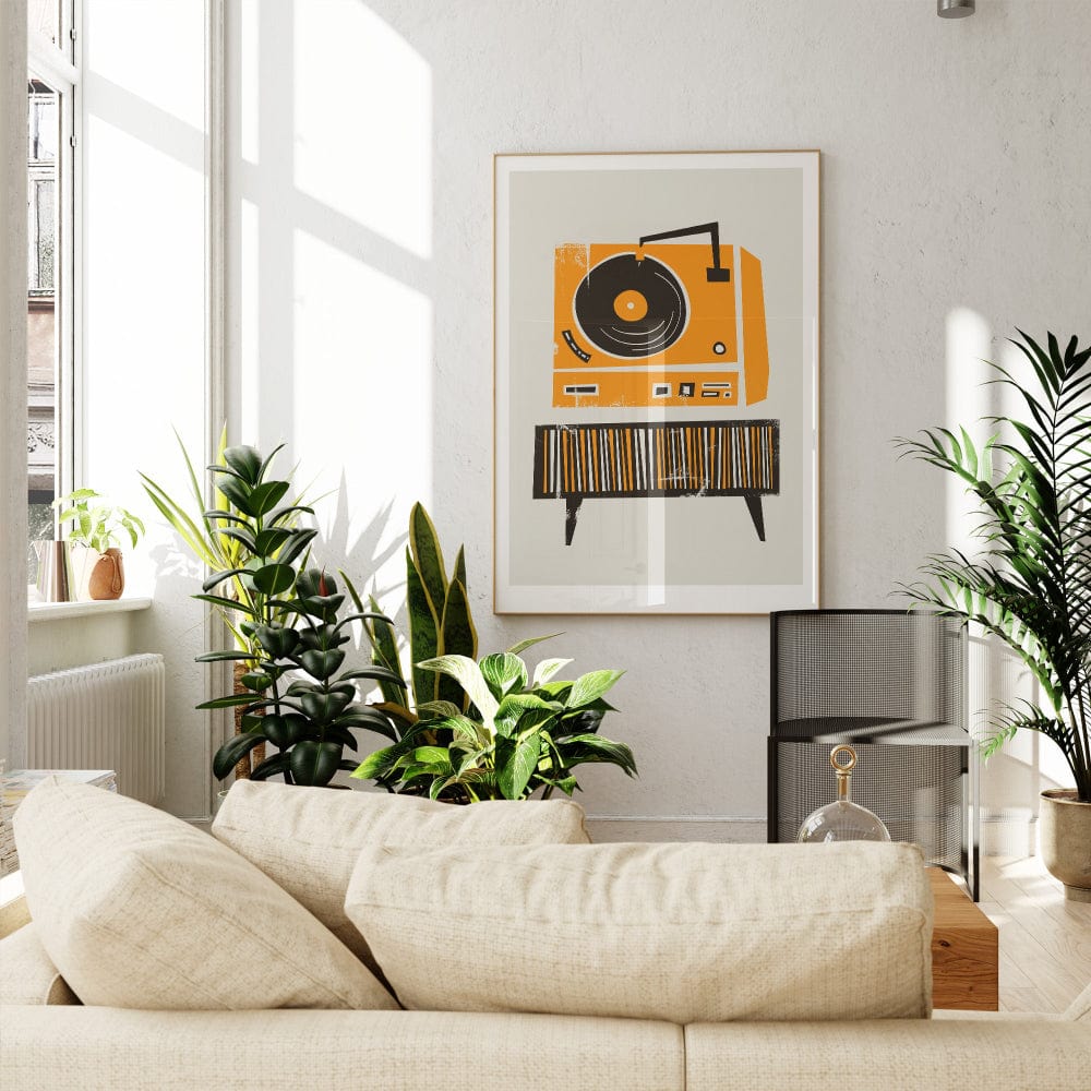 Record player art print hanging in a bright, plant-filled living room, adding a splash of retro colour and rhythm to a modern home setting.
