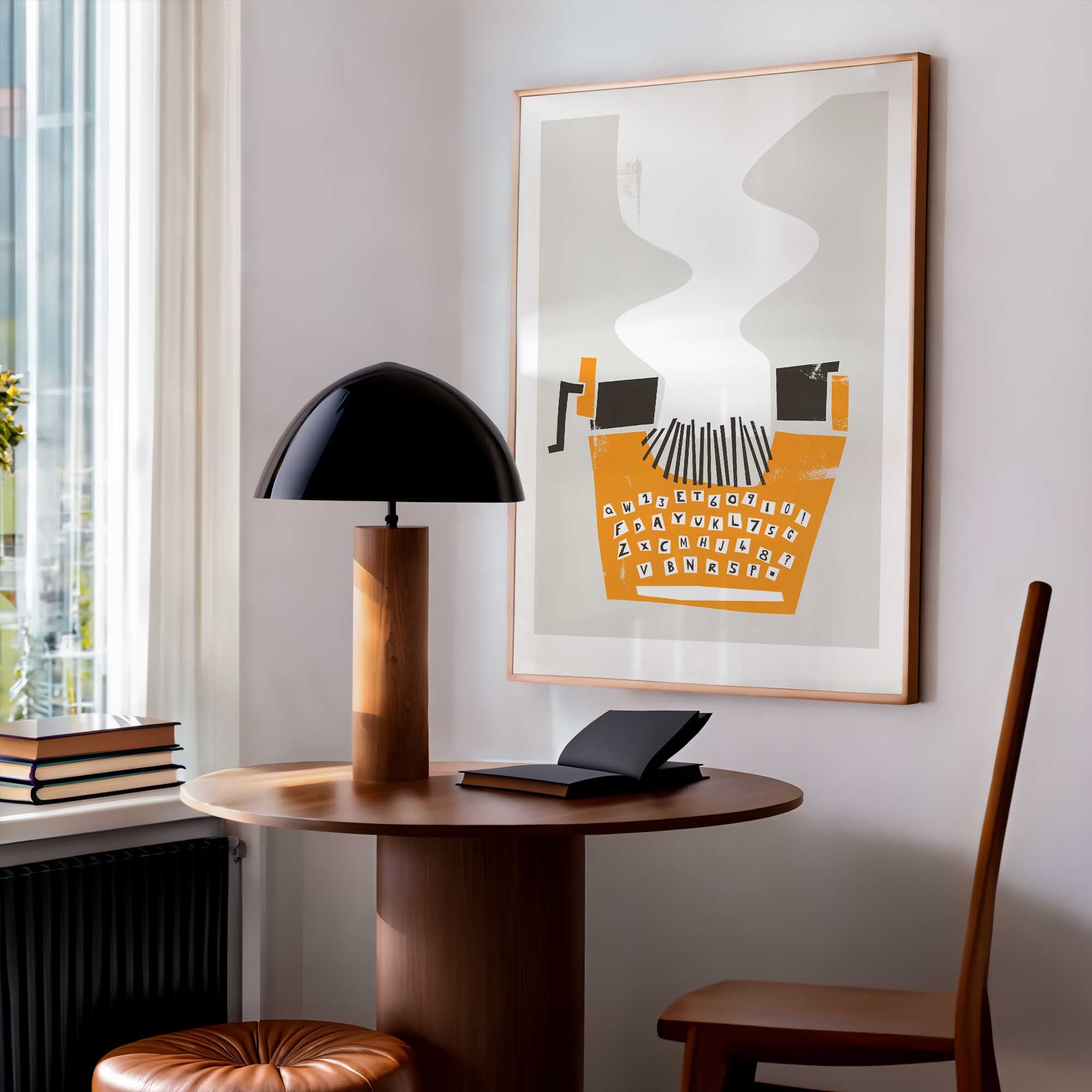 Modern interior with a table, lamp, and typewriter art print art on the wall.