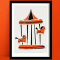 A Parisian Carousel Print in Mid-century style, in orange and black, framed and set against orange wall