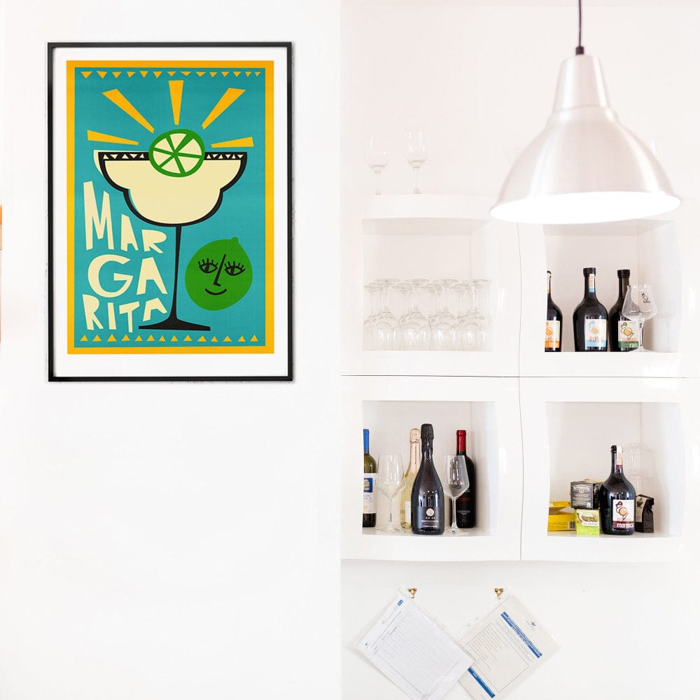 Margarita cocktail art framed in a fresh, white bar nook with shelves of wine and spirits — a sunny twist for a curated drinks corner.