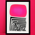 A Labyrinth Abstract Art Print in Vibrant pink and black, with maze-like labyrinth lines and soft edges, framed against a pink wall.