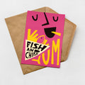 A colorful card with a pink background and bold text, including the words "FISH AND CHIPS" and "LUMIN".