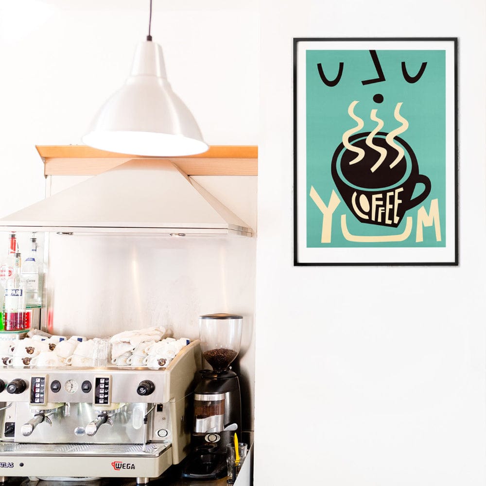 Retro-inspired coffee print styled above a sleek café espresso machine in a contemporary café setting.