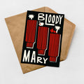 A greeting card with the text "BLOODY MARY" printed on it, along with a design featuring red and black striped objects.
