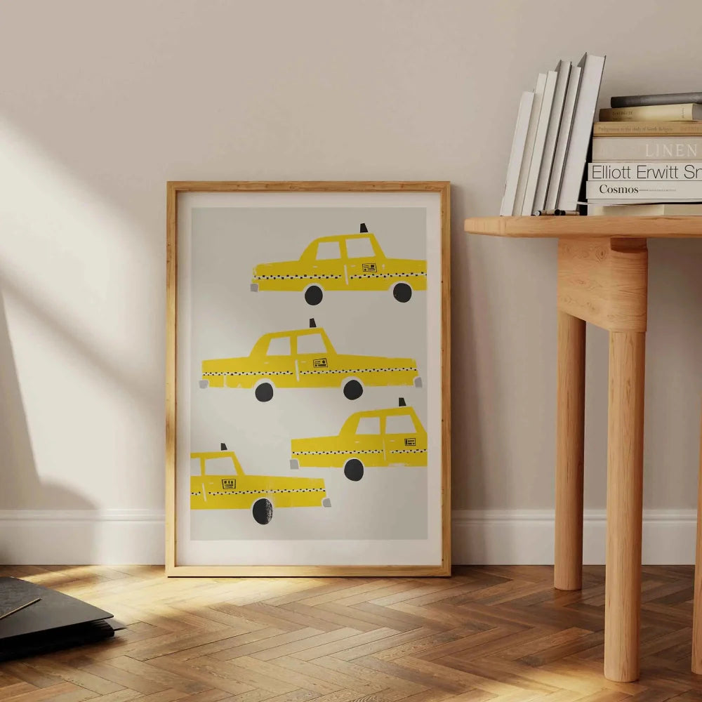 New York Taxi Print in pine frame next to dining table on wooden floor