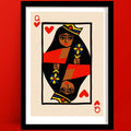 Bold Queen of Hearts print in mid-century playing card style, framed on red wall