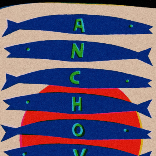 Close-up of anchovy tin illustration showing blue fish and hand-lettered text.
