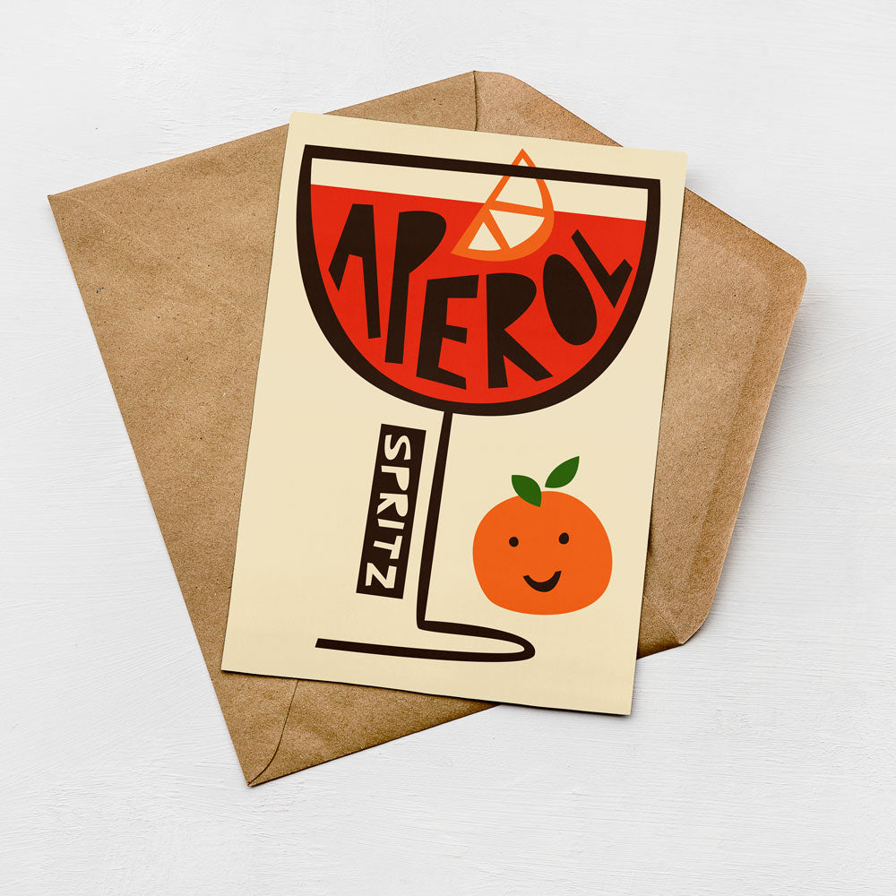 A card with a graphic design featuring a glass of red wine and an orange, along with the text "APEROL" and "SPRITZ".