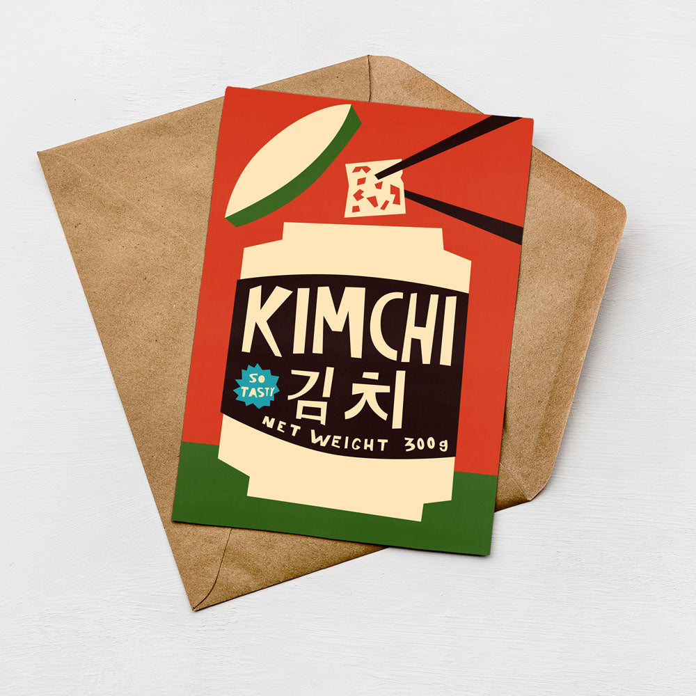 A greeting card with a red background and a black and white illustration of a container with a green lid, along with text in Korean and English.