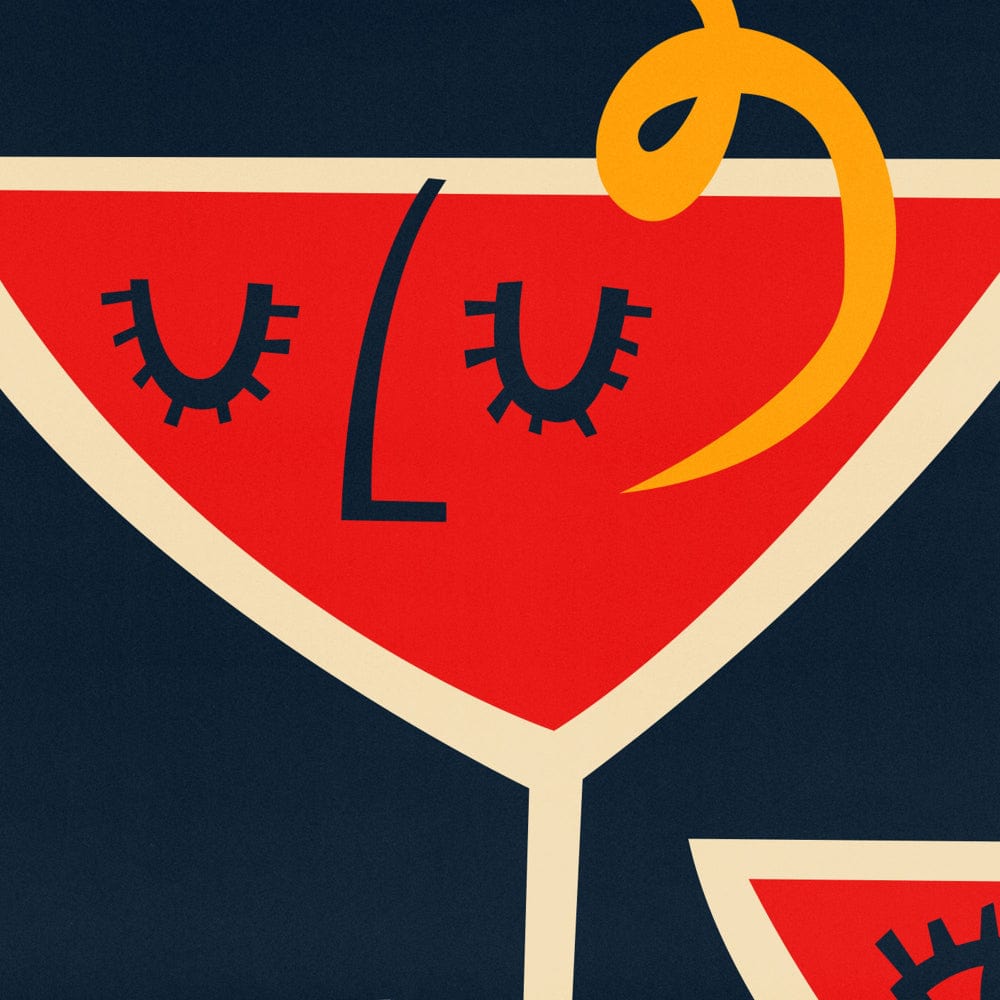 Close-up of the Cosmopolitan print showing simple, closed-eye facial lines and a looping lemon peel garnish across a crimson martini glass.