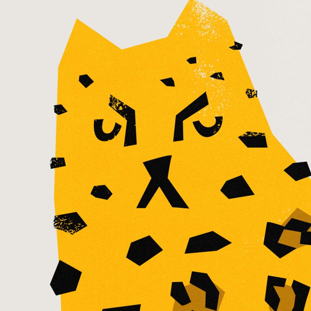 Close-up of the leopard’s face, featuring sharp, angular eyes and markings.