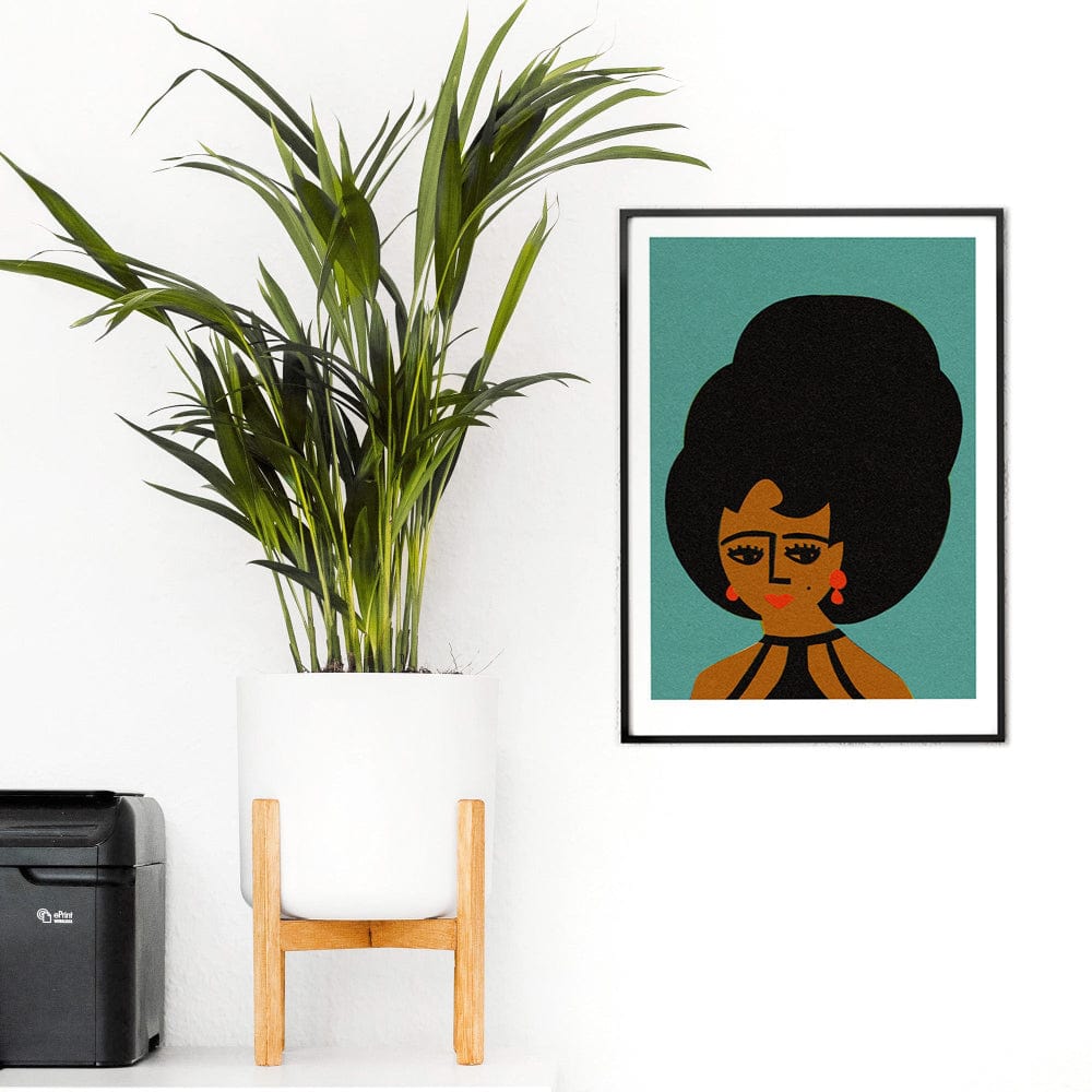 Beehive portrait art print styled with tall leafy plant and wooden chair in clean modern space