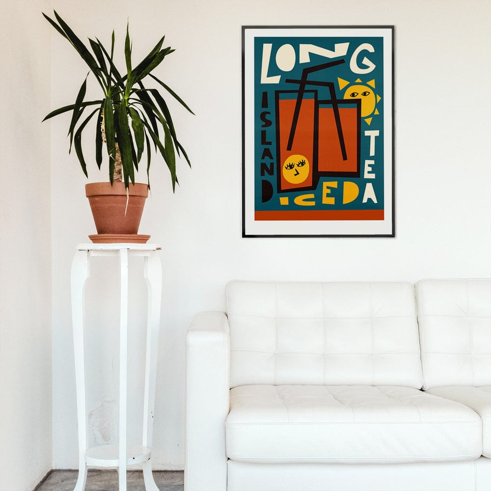 Cocktail art print framed above a white sofa and plant, bringing fun and bold contrast to a bright modern space.