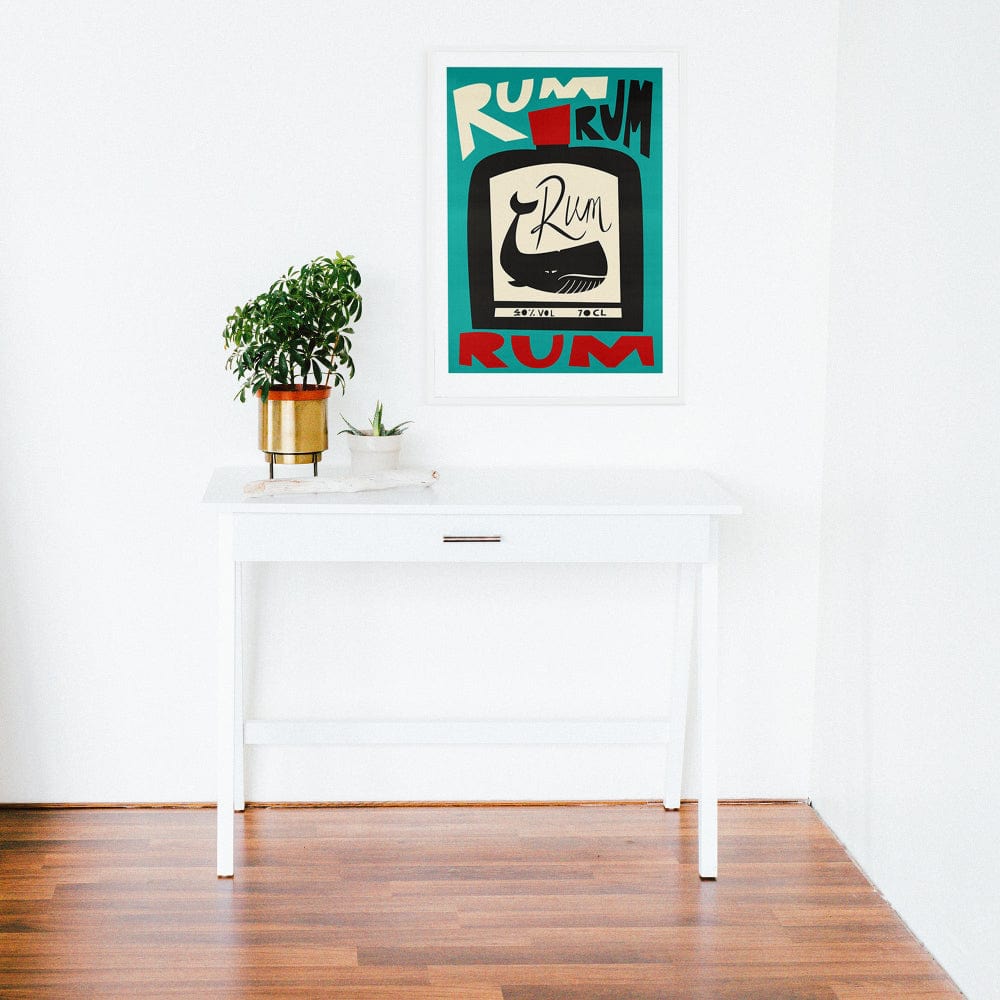 Contemporary kitchen or bar decor with a graphic rum print in clean black, cream, and red tones.
