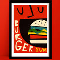 A vibrant, pop-art-style burger print  illustration featuring a layered cheeseburger about to be devoured, with playful typography spelling “YUM.”