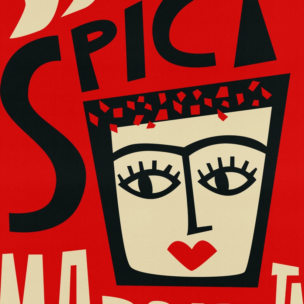 A close-up look at the Spicy Margarita face design, highlighting graphic black lashes, sharp typography, and the red chilli crown against a deep red backdrop.