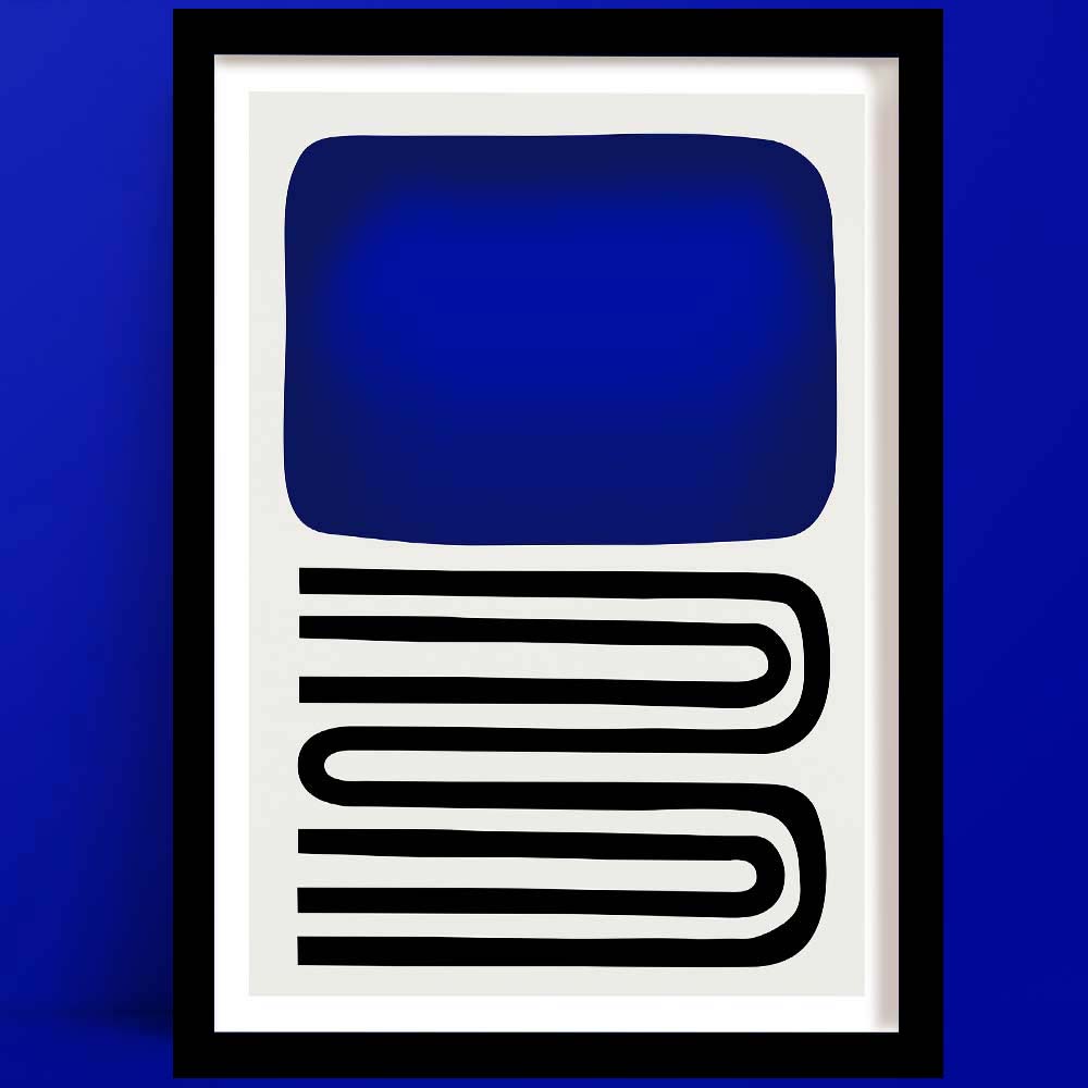 An out of the blue abstract art print, framed, with bold blue block and curved black lines, set against blue wall.