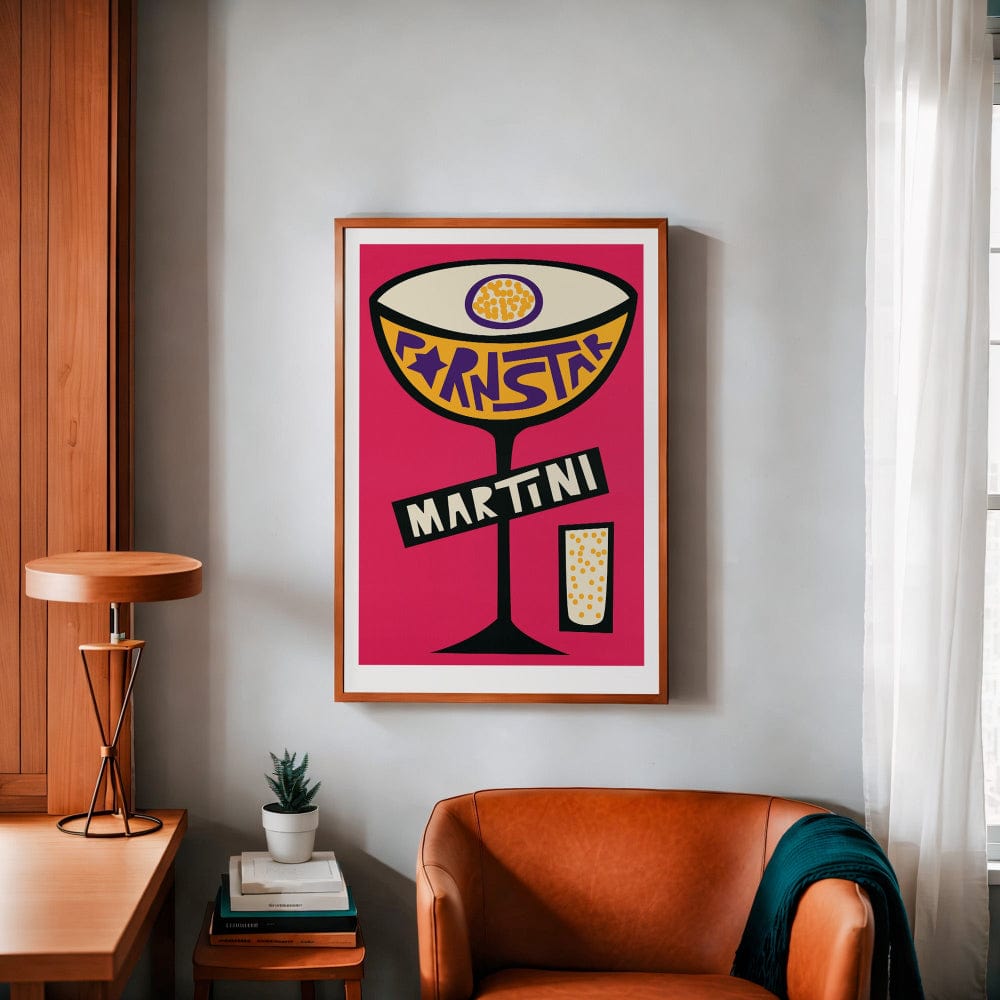 The framed print adds bold personality to a cosy reading nook with warm-toned walls and a caramel armchair, balancing quirk and sophistication.