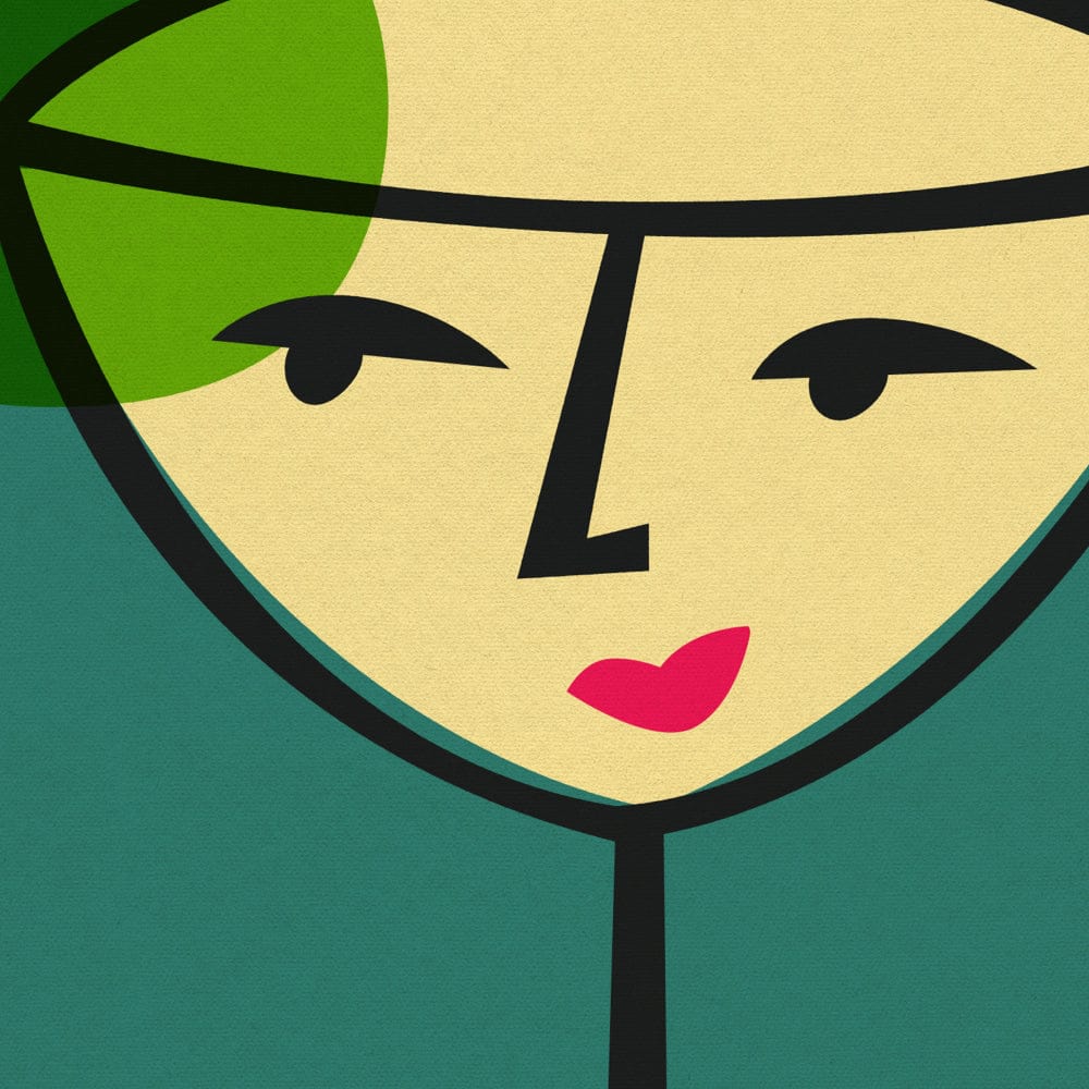 Close-up of the daiquiri glass with a curved smile, bold black features, and a lime wedge forming the hairline.