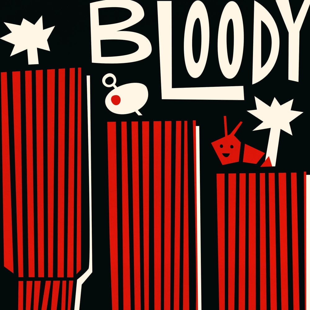 A detailed view of the striped red glasses and their quirky toppers—playful and punchy, evoking the spicy character of the iconic brunch cocktail.