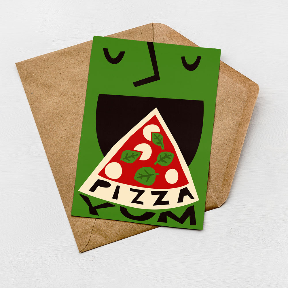 A green card with a playful design featuring a pizza slice and the word "PIZZA" written on it, placed on a brown envelope.