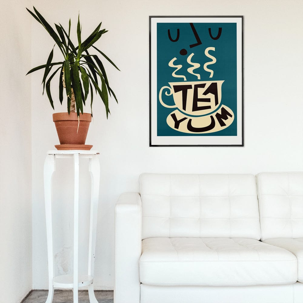Framed tea print hanging above a white sofa, balancing modern lines with retro charm.